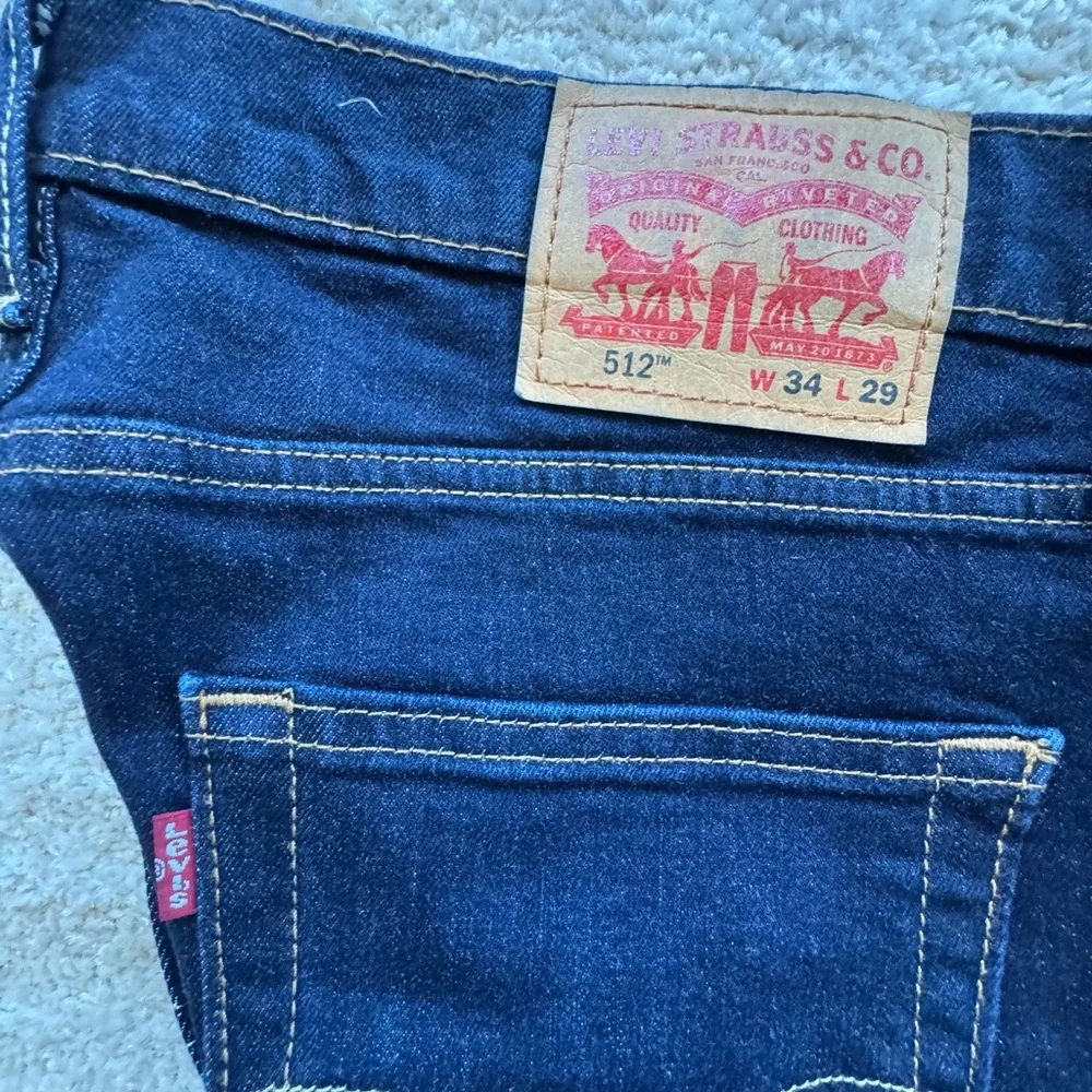 Levi's Men's Dark Indigo Slim Straight Jeans  W 34/ L 27.5